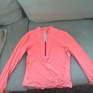 Selling a Lululemon pink shirt with haft zip and size 4